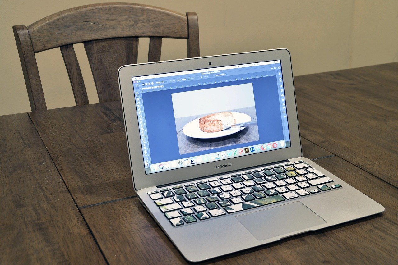 computer, laptop, technology, photoshop, adobe, design, designer, work, working, screen, wood, wooden, table, home, macbook air, macbook, brown computer, brown laptop